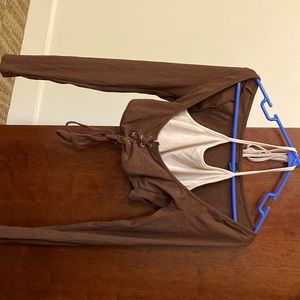 Crop top double long sleeve shirt. Brown and crème colored
